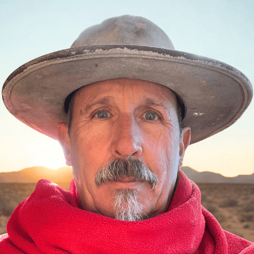 Marko Schmitt, founder of Guiderly, photographed in the New Mexico desert at dawn